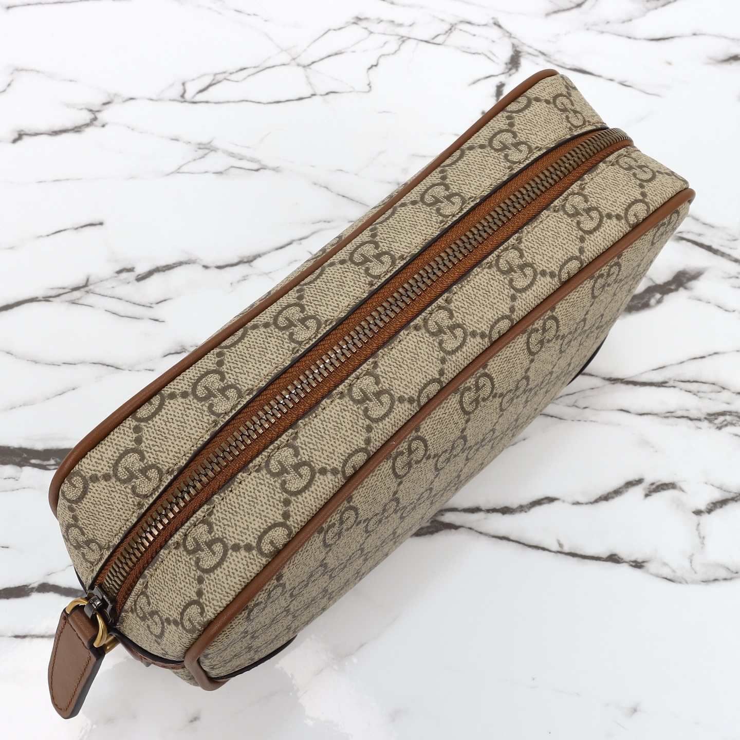Gucci GG Emblem Small Toiletry Case — 821164