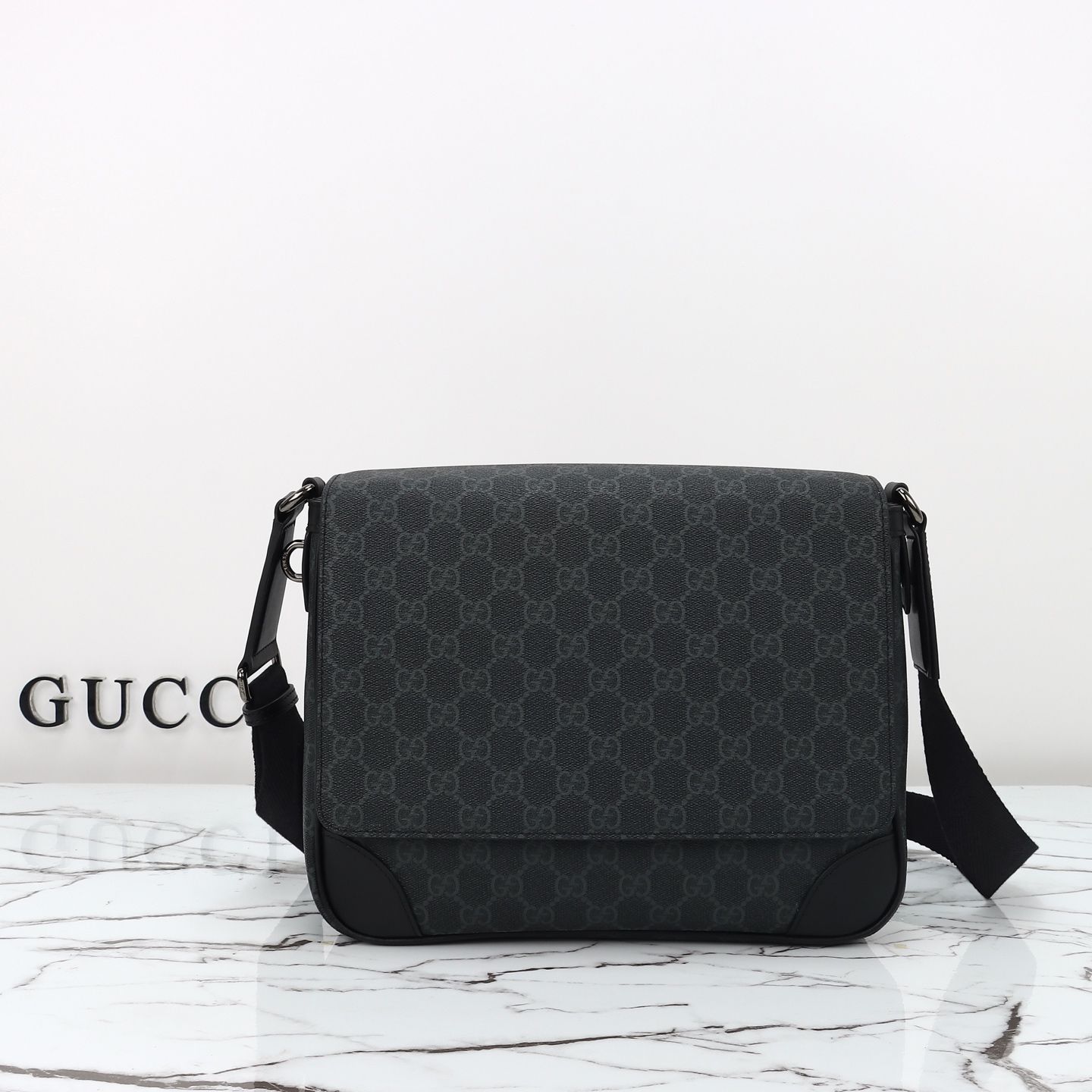 Gucci GG Emblem Medium Crossbody Bag — 821154