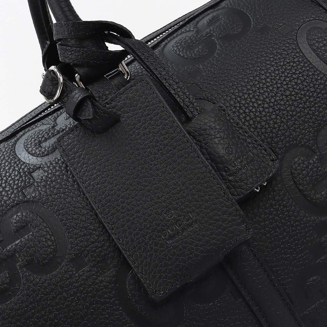 Gucci GG Embossed Duffle Bag — 725282