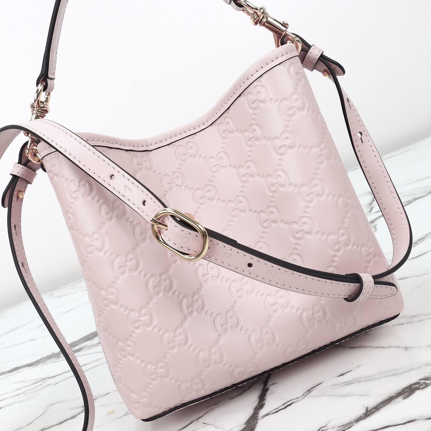 Gucci GG Emblem small bucket bag — 815118