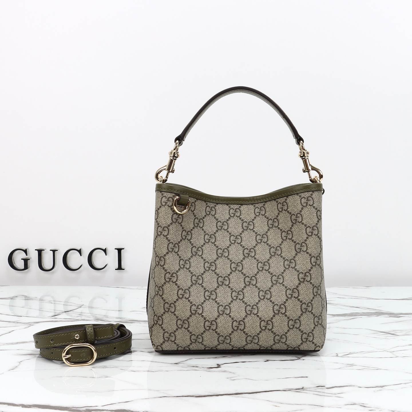 Gucci GG Emblem small bucket bag โ 815118