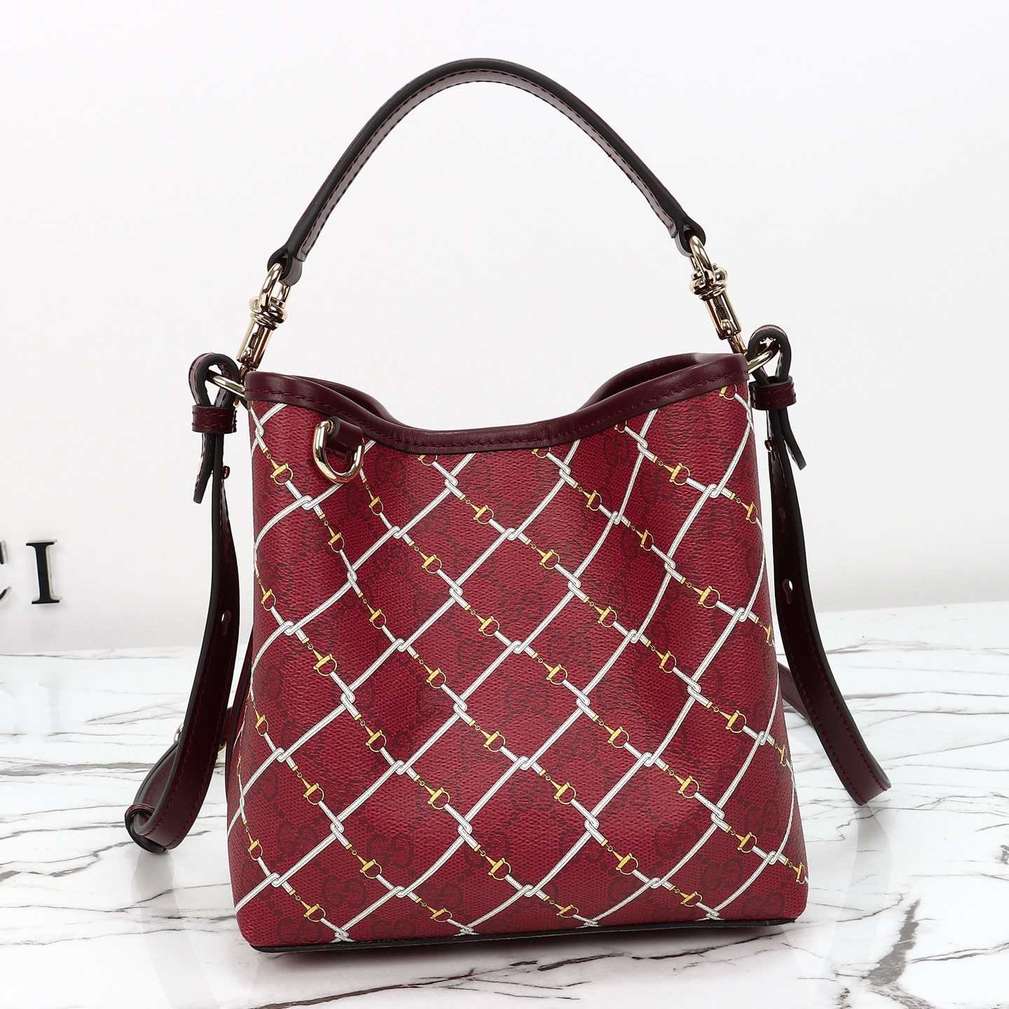 Gucci GG Emblem small bucket bag — 815118