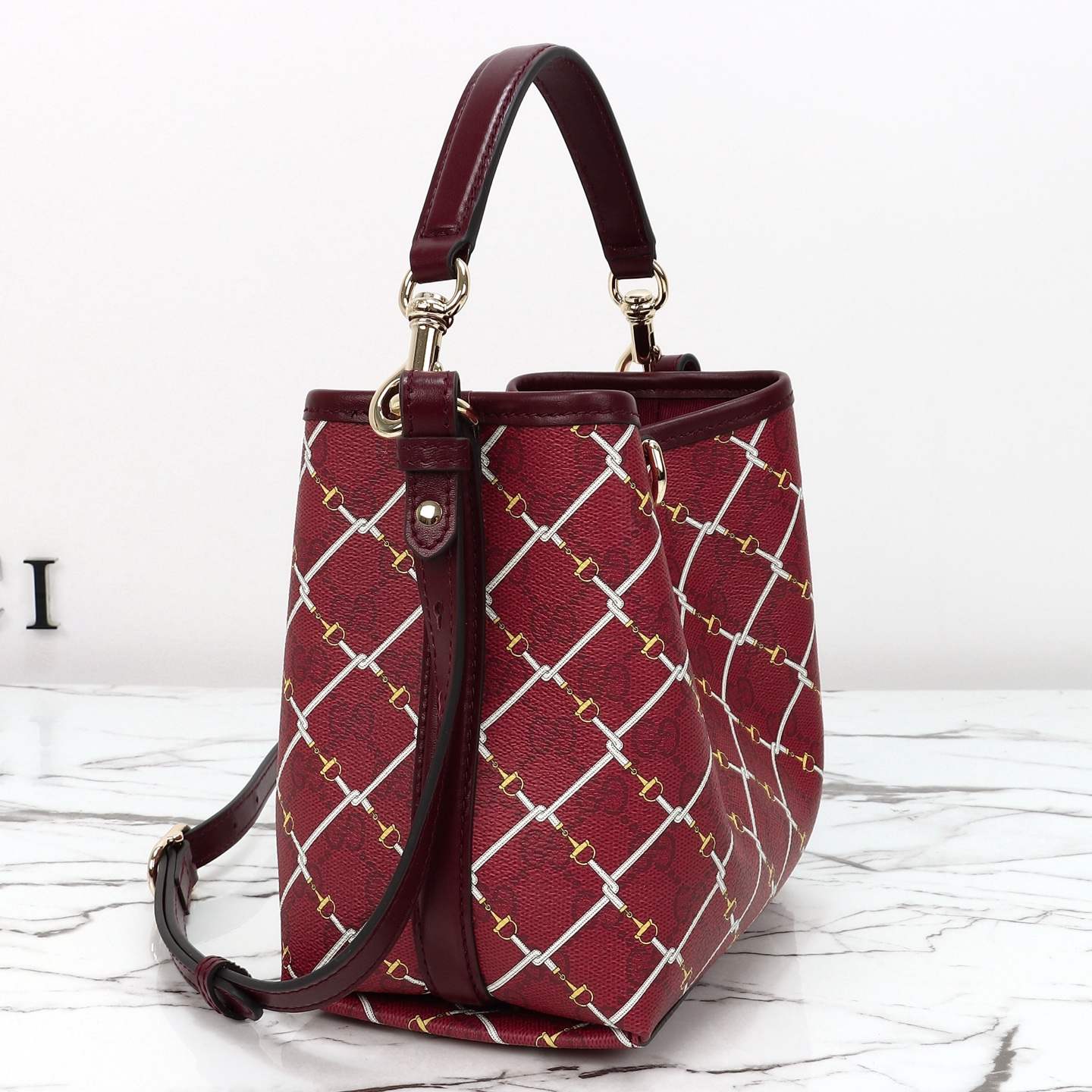 Gucci GG Emblem small bucket bag — 815118