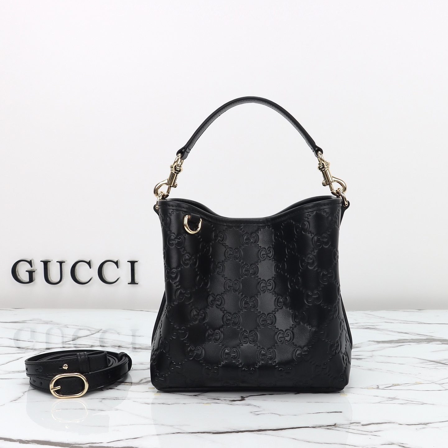 Gucci GG Emblem small bucket bag โ 815118