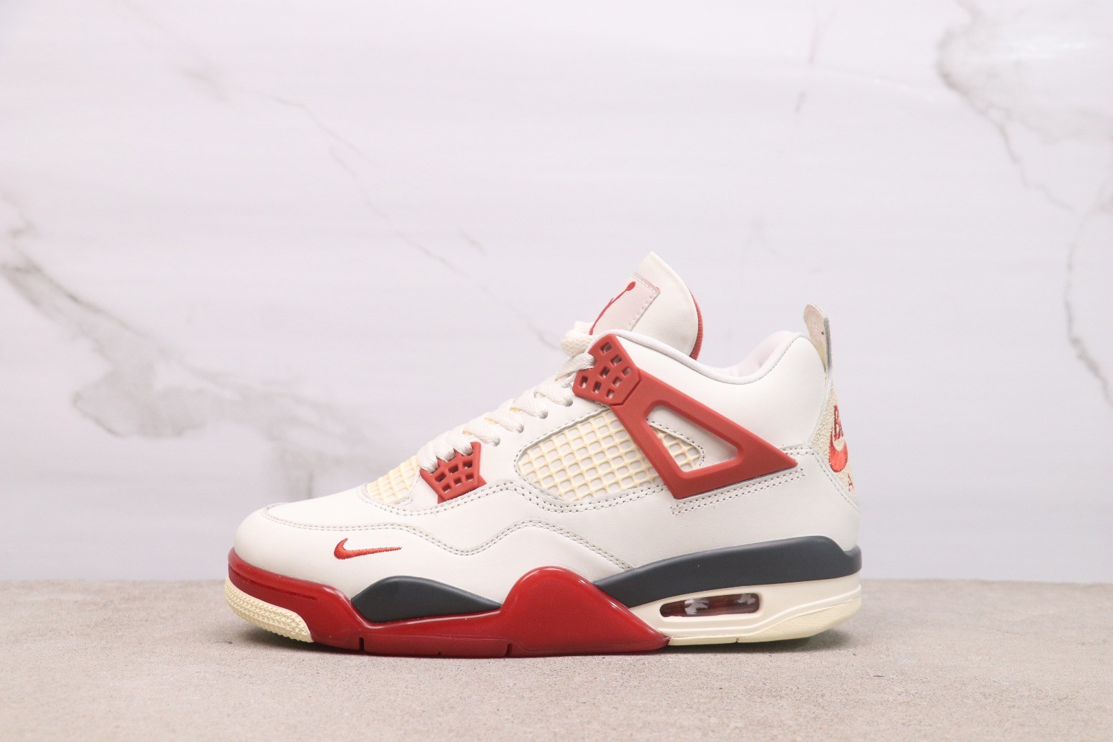 Air Jordan 4 Retro “Brick After Brick” IQ8055-100