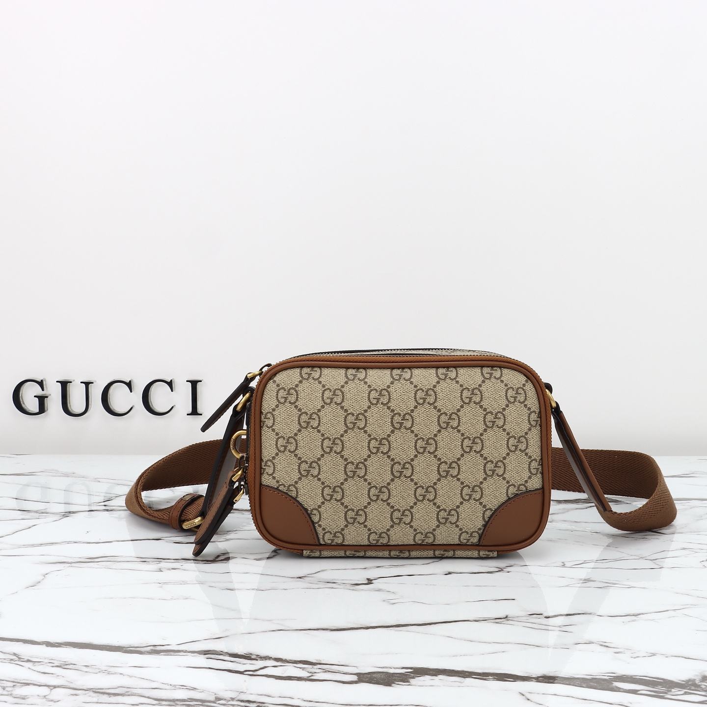 Gucci GG Emblem Mini Crossbody Bag — 821217