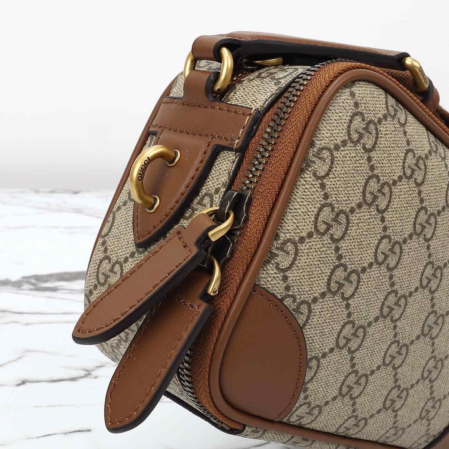 Gucci GG Emblem Mini Crossbody Bag — 821217