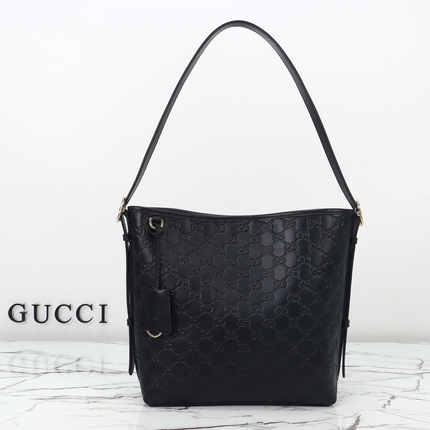Gucci GG Emblem Small Shoulder Bag — 848881