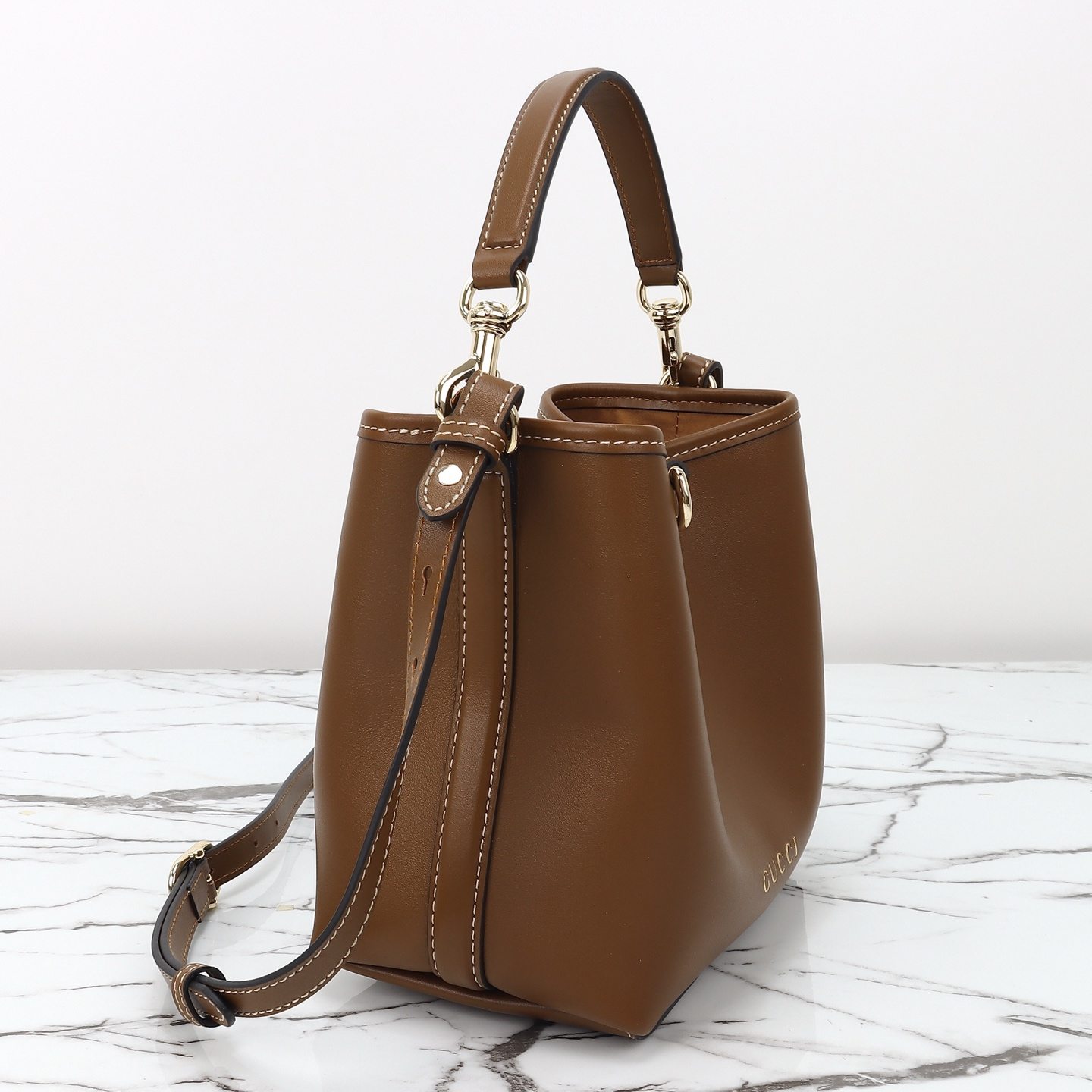 Gucci GG Emblem Mini Bucket Bag — 815118