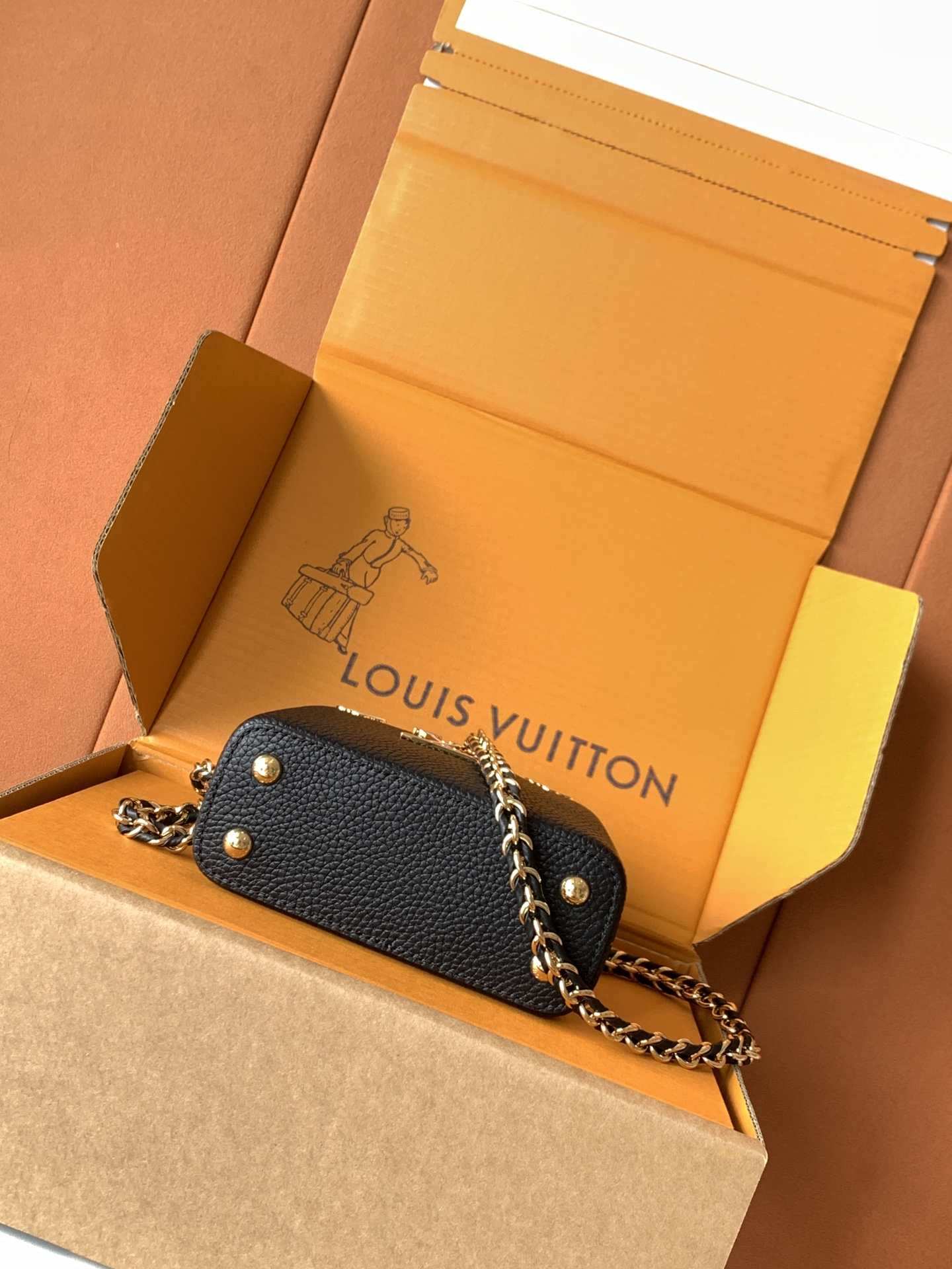 Louis Vuitton Nano Capucines Bag — M10166