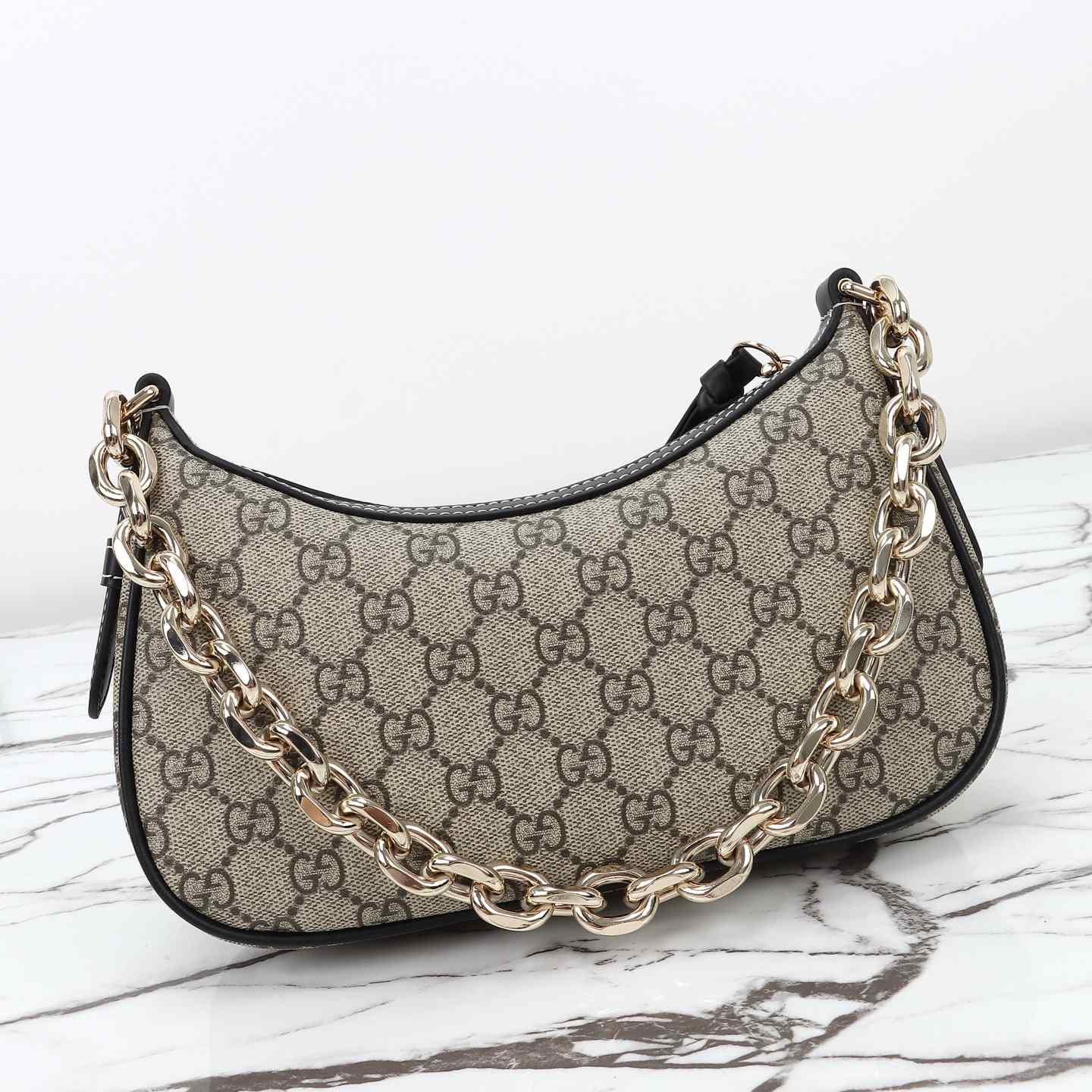 Gucci GG Emblem Small Shoulder Bag — 847447