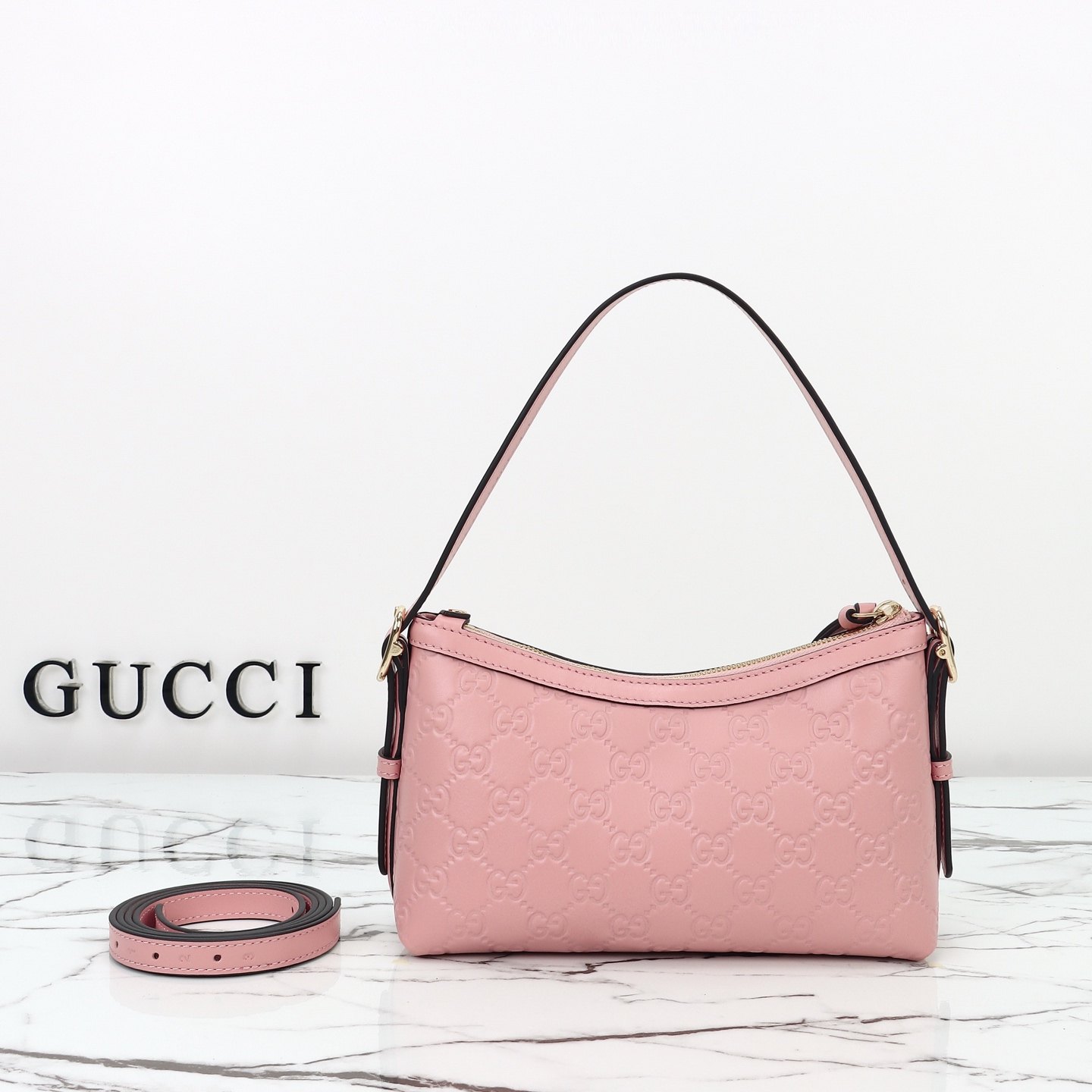 Gucci Embossed GG Mini Shoulder Bag — 847450